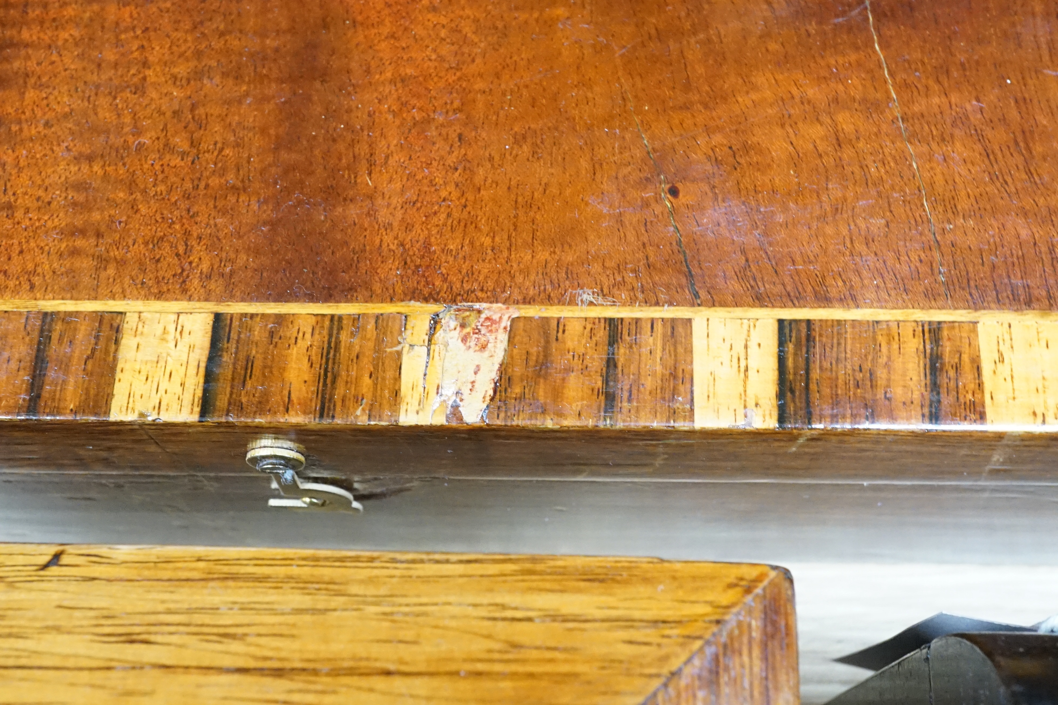 A Victorian coromandel stationary box, a rosewood tea caddy, an olive wood jewellery casket, a mahogany box and a chinoiserie panel, largest 41cm wide